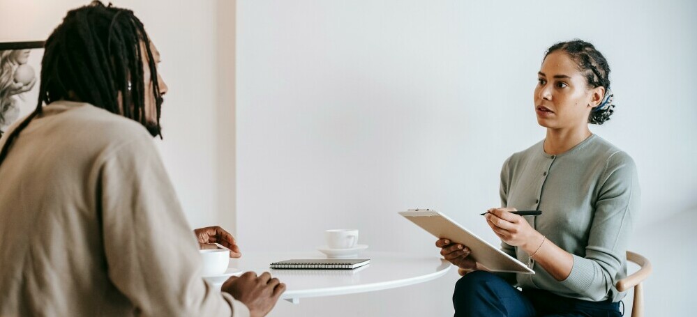 therapist with clipboard
